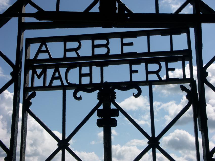 Detail of the main gate at Dachau concentration camp in Germany, displaying the &quot;Arbeit Macht Frei&quot; sign