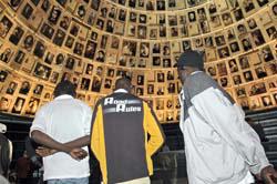 Sudanese refugees in the Hall of Names, Holocaust History Museum, Yad Vashem. (Yossi ben David/Yad Vashem) 