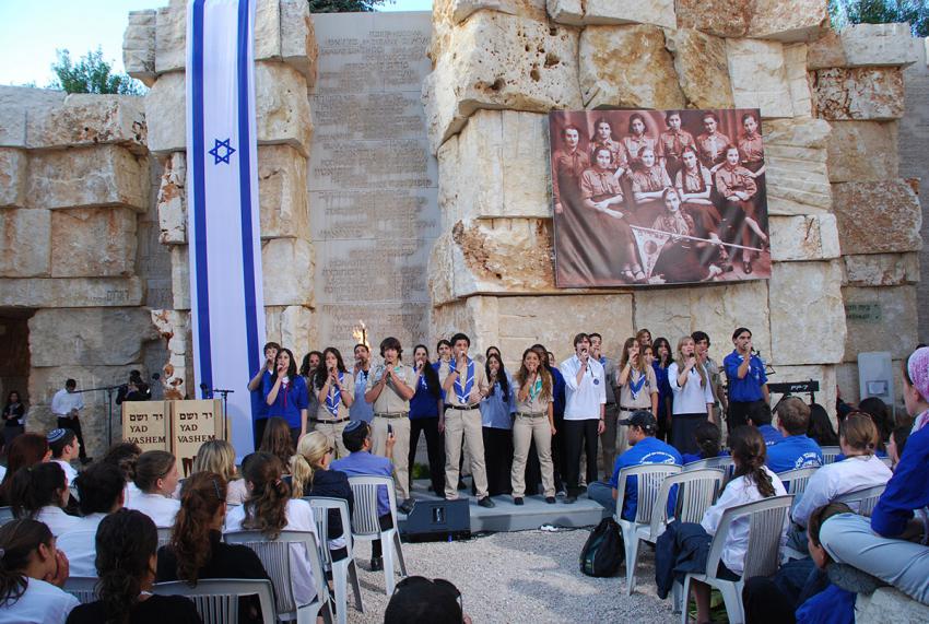 The Collective Youth Movement Group sings during the ceremony