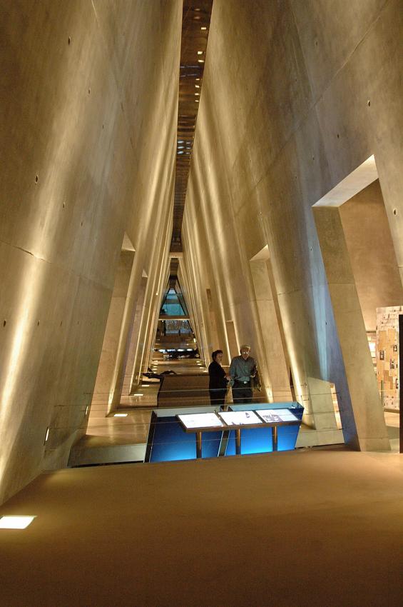 Interior view of the Holocaust History Museum. Architect: Moshe Safdie