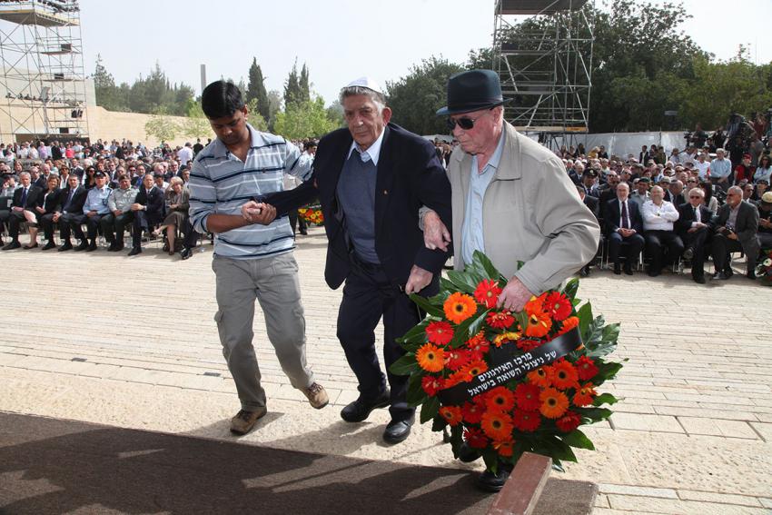 Representatives of survivor organizations during the wreath-laying ceremony