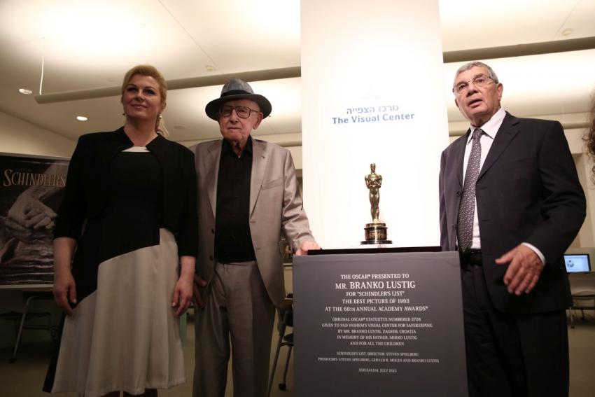(L-R) Croatian President H.E. Ms. Kolinda Grabar-Kitarovic, Branko Lustig and Yad Vashem Chairman Avner Shalev standing by the Oscar statue donated to Yad Vashem by Lustig in July 2015