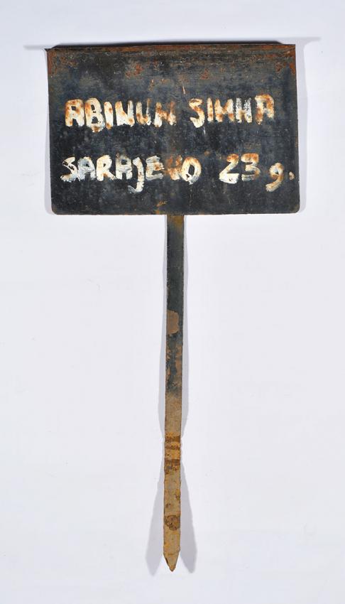   A grave marker inscribed with the name of Abinun, Simha of Sarajevo who was murdered in Djakovo Camp aged 23