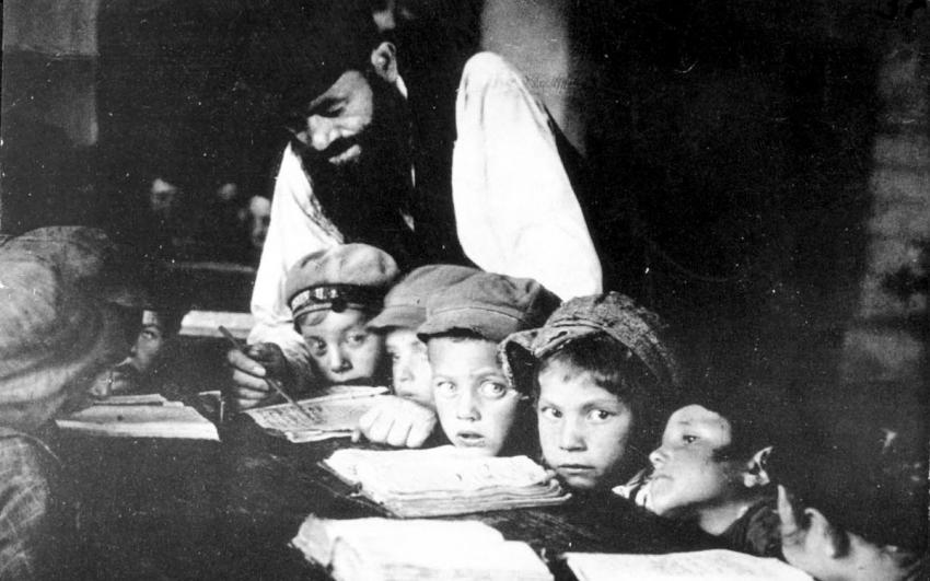 Jewish boys studying Torah at a cheder, a religious Orthodox elementary school, Poland, Prewar.