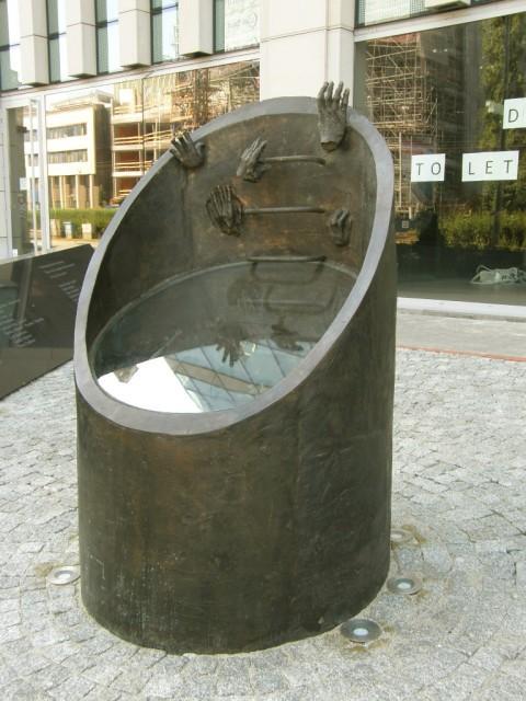 The monument established near the sewer opening from which the fighters were rescued during the uprising, at 51 Prosta Street in Warsaw