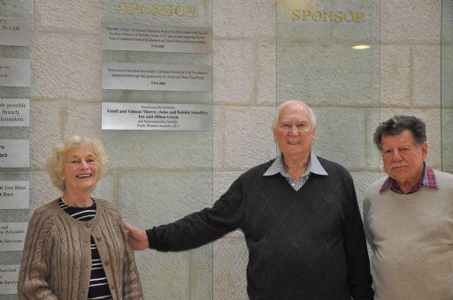 Geoff (center) and Valmae Morris, together with Geoff's cousin Gideon Tiktin, visited the Holocaust History Museum and Children's Memorial on 24 December. Following their tour, they viewed their plaque in the International School for Holocaust Studies