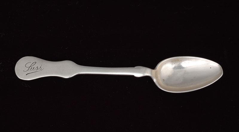 Silver teaspoons engraved with the name of the young girl, Suzy