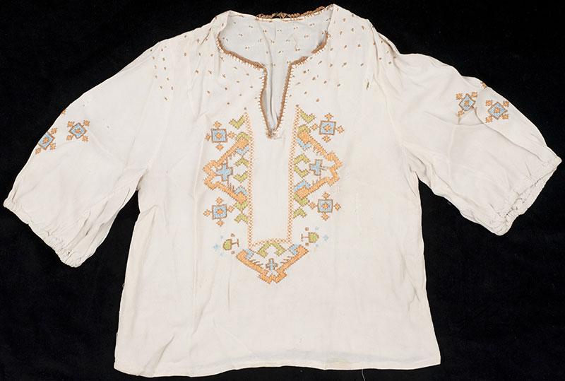 The blouse that Chana Kuklinska wore throughout her time in the camps