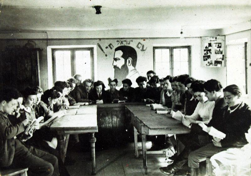 Members of the hachsharah group at Firstbach being taught by an emmisary from Eretz Israel