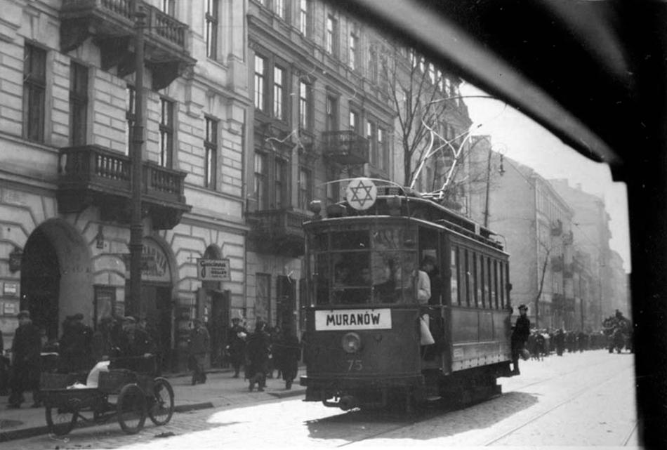 Trolley car for Jews only inside the Warsaw ghetto. Photographed from inside a moving vehicle.