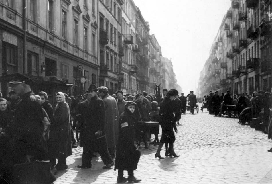 Crowded street scene inside the Warsaw ghetto