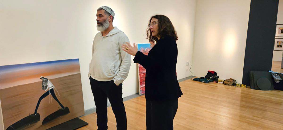 Shai Azoulay with the Director of Art Collection, curator Eliad Moreh-Rosenberg