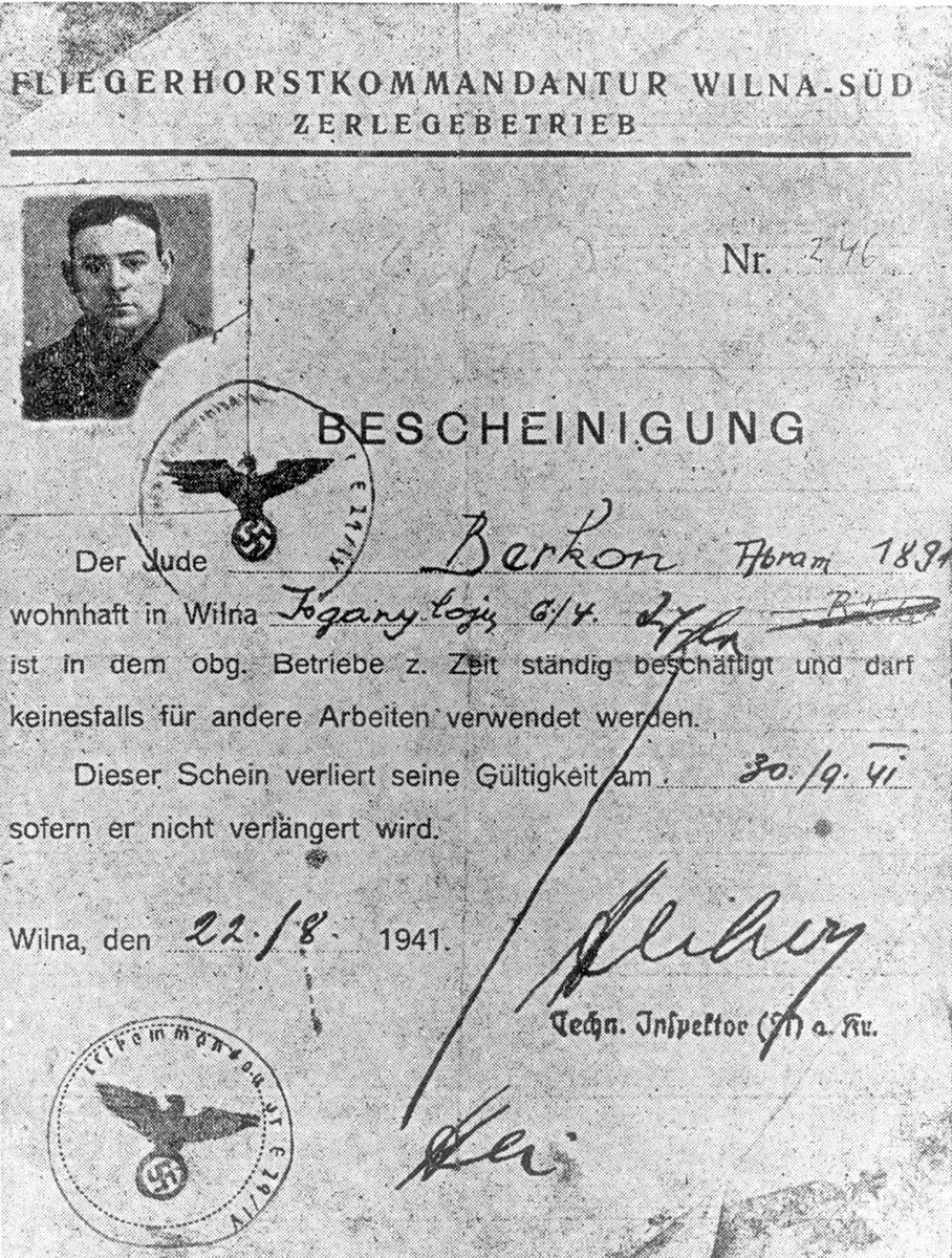 Abram Berkon's ghetto work certificate, issued by the Fliegerhorst Kommandantur (German Air Force Headquarters) in Vilna, 22 August 1941