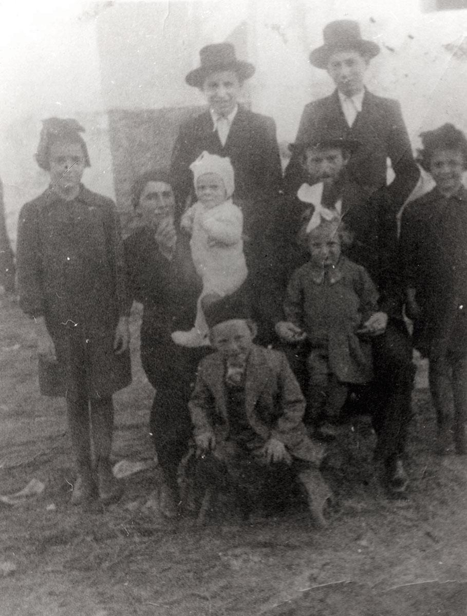 Ahuva Ostreicher Sherwood with her family, Slovakia, circa 1941. Ahuva is standing on the left