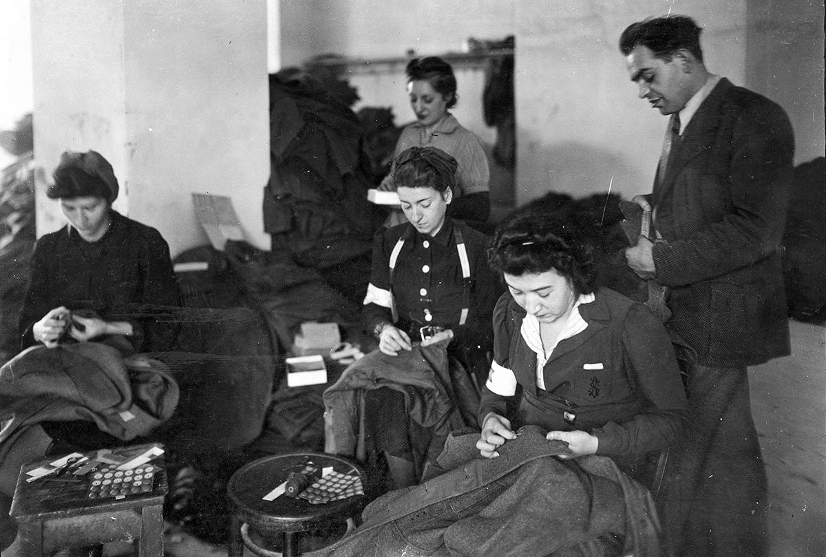 Jews from the Warsaw ghetto sewing uniforms for the German Army