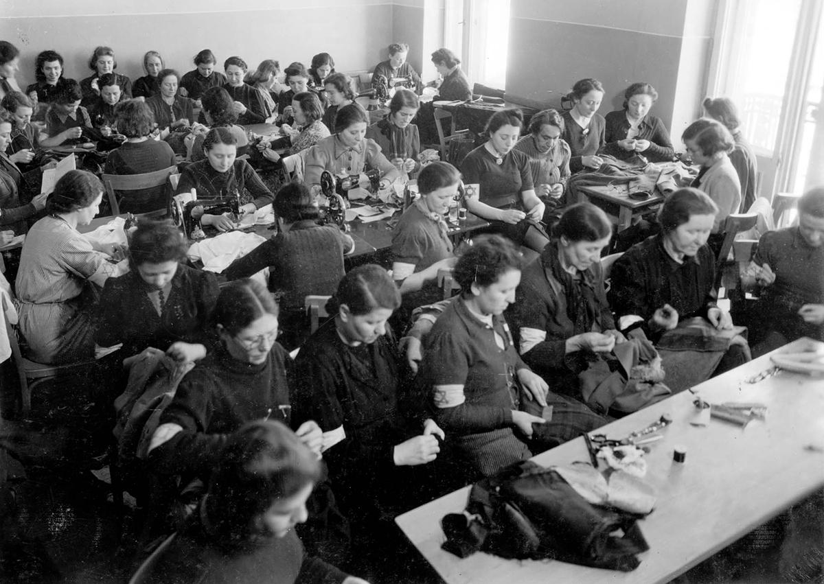 Women working in a sewing factory in the main building of the ZSS at 13 Leszno St., Warsaw ghetto