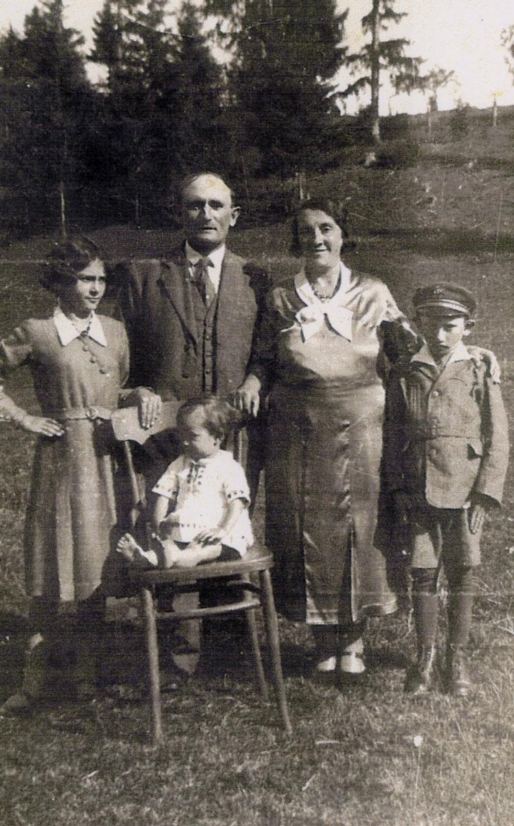 The Nojman family. From left: Sally, Abba, Esther, Zvi and baby Judith, Dihtinet, Romania, circa 1935