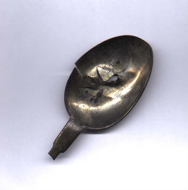 Spoon with a bullet-hole found at the Ponary murder site in 1955