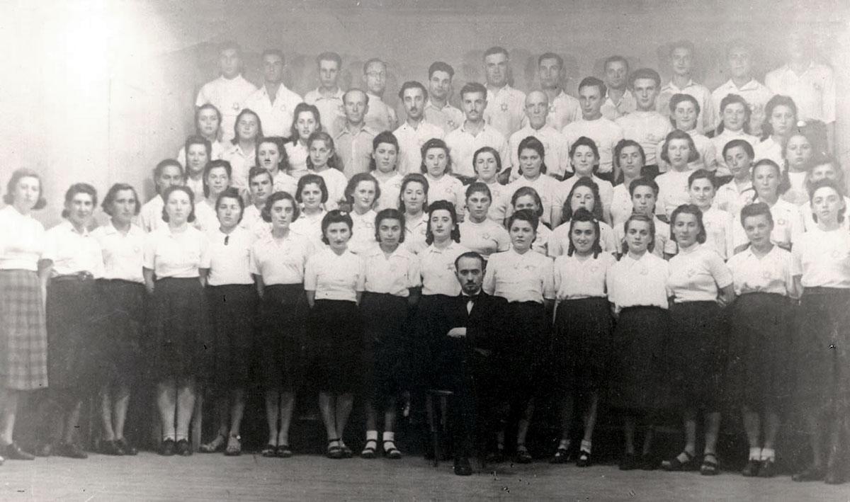 The Vilna ghetto choir and conductor Wolf Durmashkin, who was murdered in the Klooga camp, Estonia.