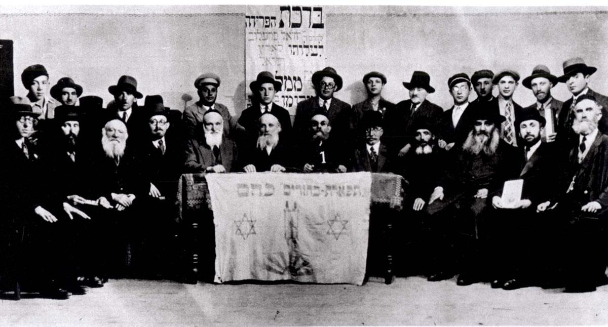 Members of &quot;Tiferet Bachurim&quot; at a farewell party for Rabbi Yechiel Sraelow (marked with the number 1) on the eve of his immigration to Eretz Israel (Mandatory Palestine). Vilna, 1934 
