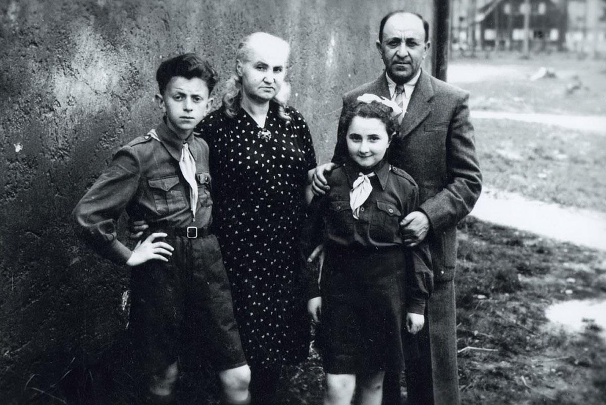The Gerges family, Shmuel, Bilhah and their children Pesakh and Esther in Purten DP camp, Germany, 1947
