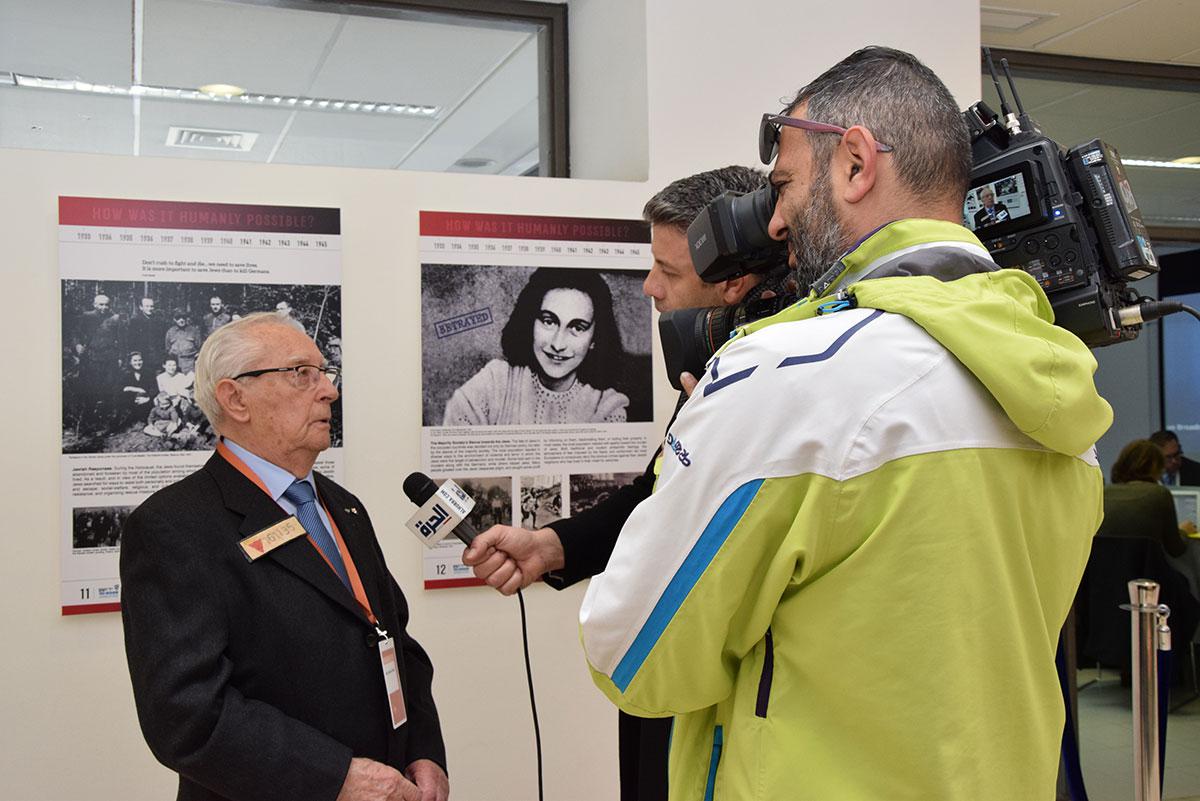 Holocaust survivor Michael (Miki) Goldman-Gilad being interviewed by the press prior to the beginning of Fifth World Holocaust Forum 2020