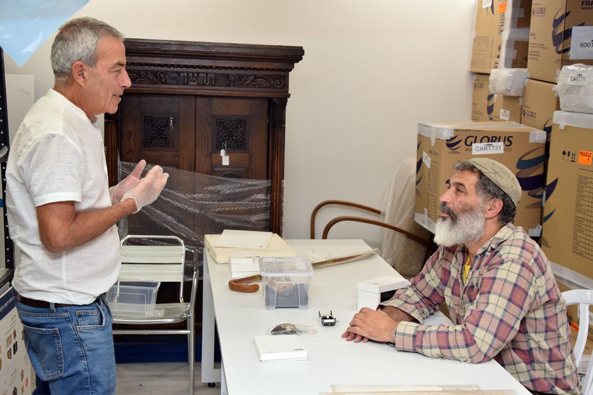 Shai Azoulay views the Artifacts Collection with its Director, curator Michael Tal