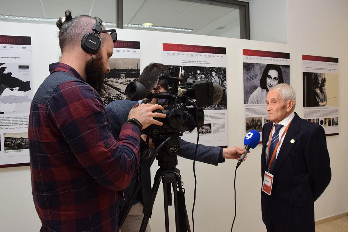 Holocaust survivor Felix Sorin being interviewed by the press prior to the beginning of Fifth World Holocaust Forum 2020