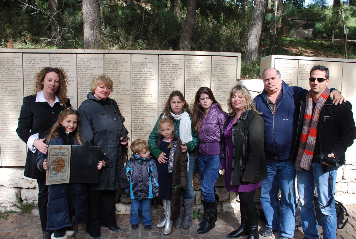 Genia Tyrangiel-Ben Ezra and her family, 23 December 2008. Genia’s parents and sister were murdered, and she was rescued by Jozef and Bronislawa Jaszczuk, who adopted her after the war