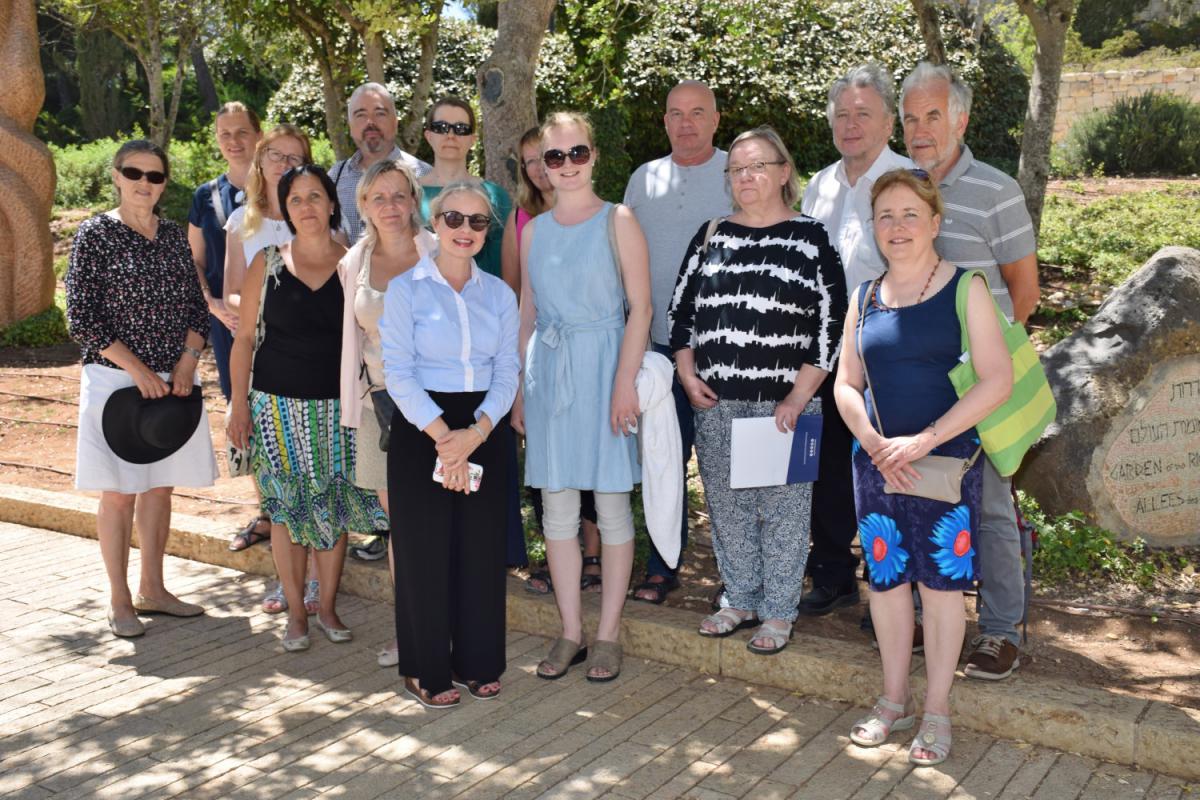 Ninarose Maoz’s (back left) Finnish group with Dr. Susanna Kokkonen (front, middle) in the Avenue of the Righteous Among the Nations, Yad Vashem on 11th June, 2018   