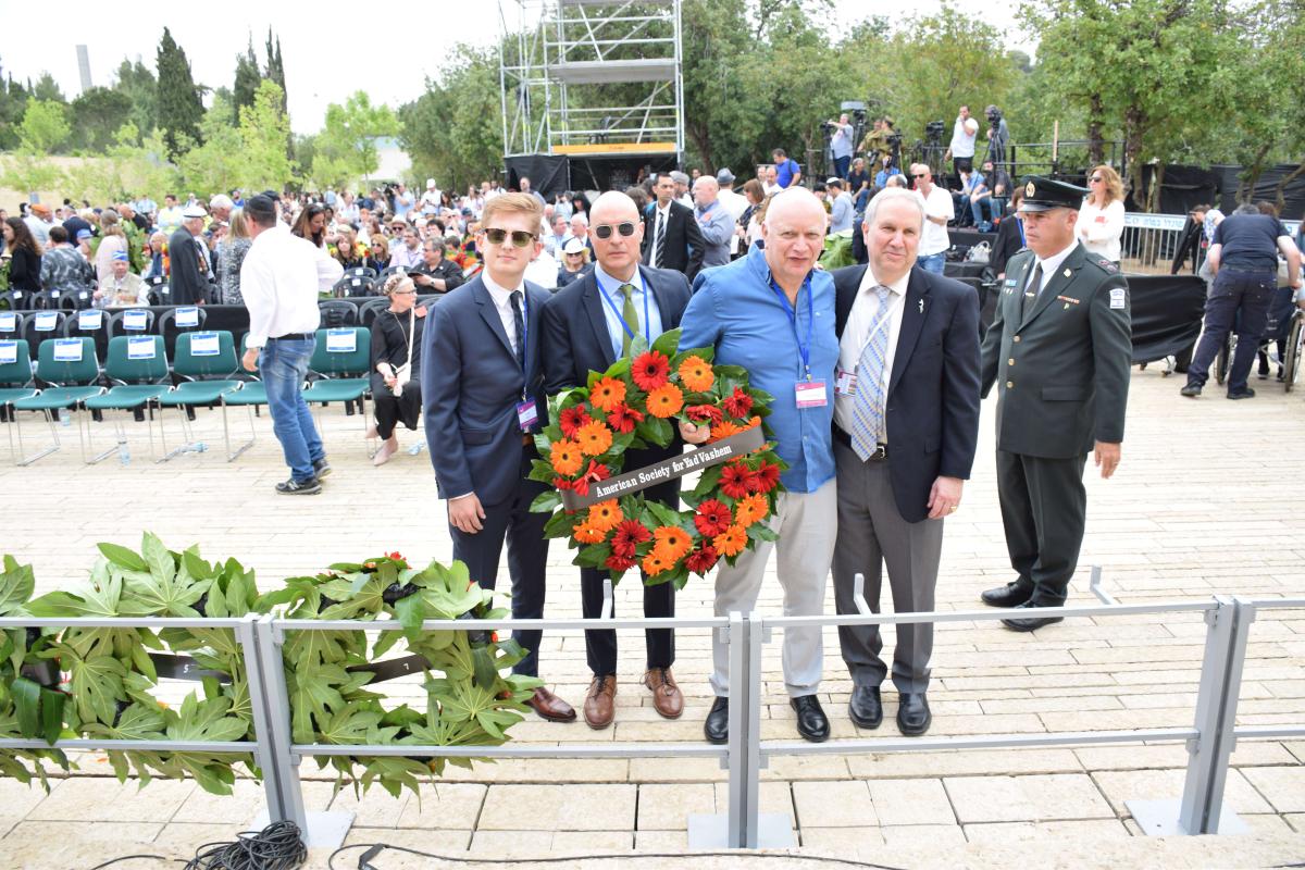 Jonah Burian, Mark Moskowitz, Murry Zborowski, and Ron Meier lay a wreath on behalf of the American Society for Yad Vashem