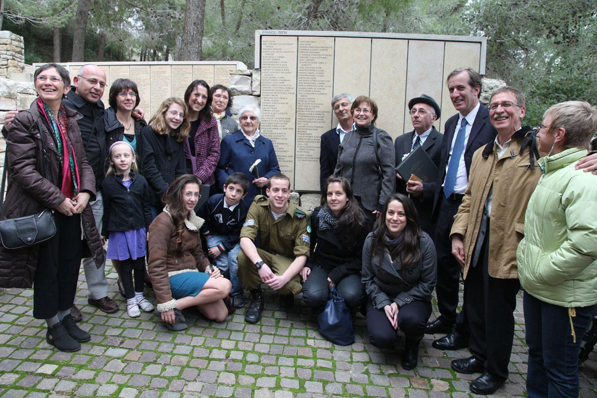 Survivor Gabi Hochman with her family and her sister’s family, and with Righteous Among the Nations, Sister Marie Emilienne and Father André Almeras, nephew of Righteous Among the Nations Father Joseph Caupert, Yad Vashem, February 28, 2012
