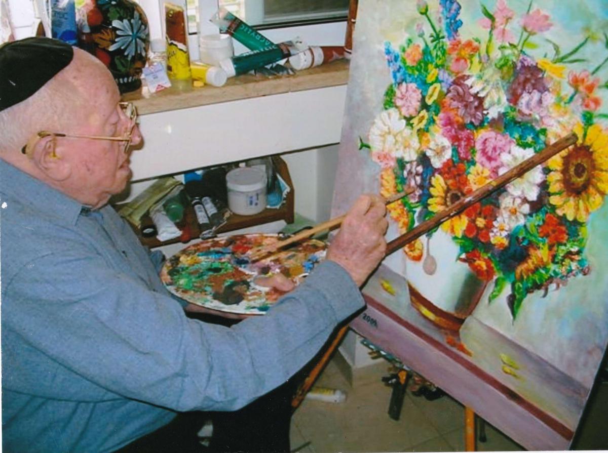 Moshe Perl as he paints