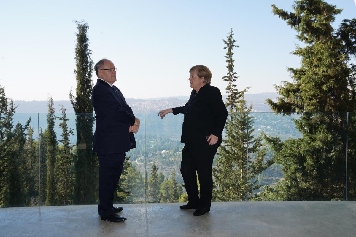 Dani Dayan with German Chancellor Angela Merkel on the balcony of the Holocaust History Museum, October 2021