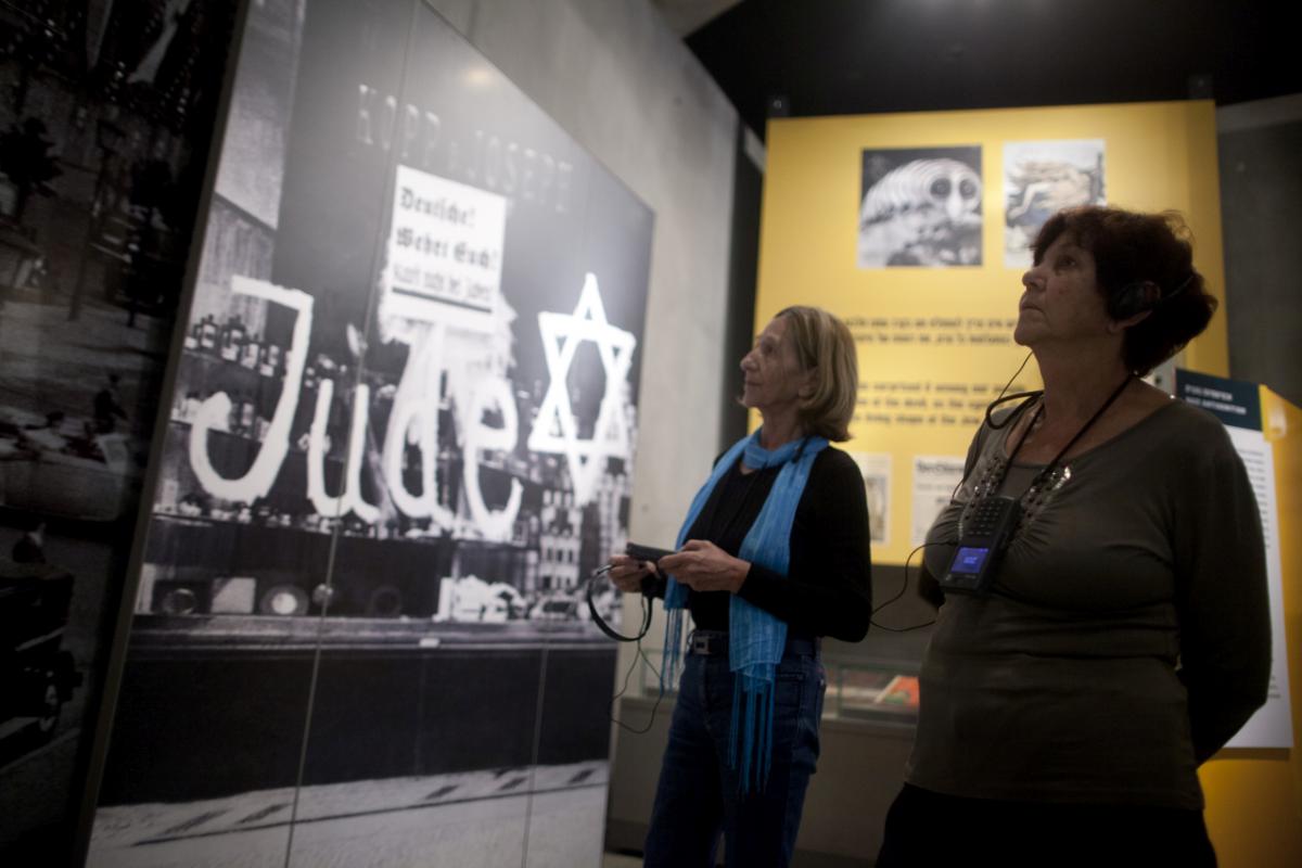 Walking through the gallery in Yad Vashem's Holocaust History Museum presenting the rise of antisemitism in Europe before WWII