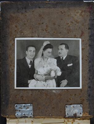A photograph that was stuck on the inside front cover of the album: Izhak Poremba and Friedl Gutman on their wedding day. Left: Emanuel Gutman, Stuttgart, 1948