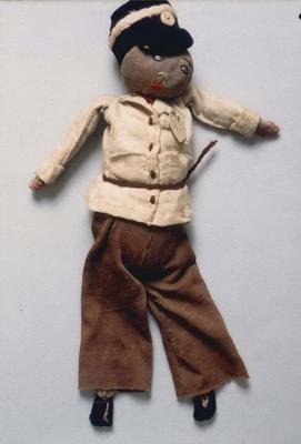 Doll dressed as a policeman, apparently representing Arnold Rubin, a Czech inmate in the Theresienstadt ghetto who was sent from there to Auschwitz and murdered
