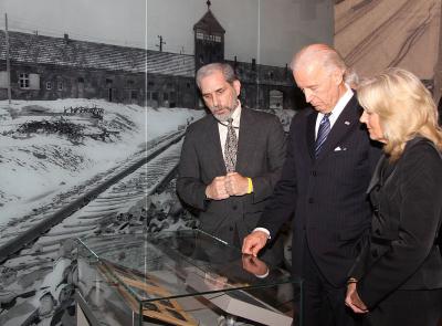 US Vice President Joe Biden, along with his wife Dr. Jill Biden, study the Auschwitz Album on display in the Holocaust History Museum. They are guided by Dr. David Silberklang, editor of Yad Vashem Studies