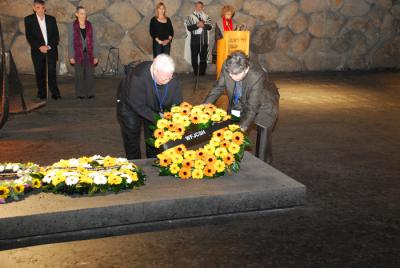 Ms. Melita Svob and Ms. Zophia Shulman, two child survivors, laying a wreath during the memorial ceremony in the Hall of Remembrance