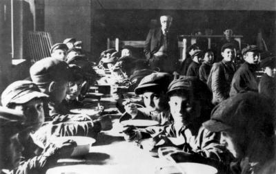 Children receiving a meal at one of the study halls in the Šiauliai ghetto