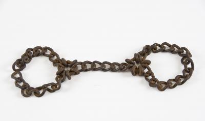 Leg irons that Jewish forced laborers at the Chelmno death camp were shackled with