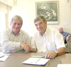 Douglas Greenberg, (left) president and CEO of the Shoah Foundation, and Avner Shalev, chairman of the Yad Vashem Directorate, after signing the agreement at Yad Vashem