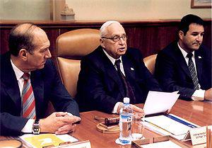 Prime Minister Ariel Sharon (center) calls on Jews worldwide to submit Pages of Testimony