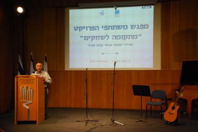 Former MK Col. (Res) Eliezer Cohen speaks at the event
