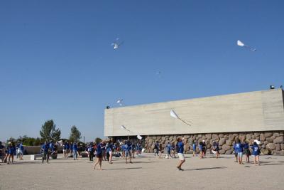 Member of the Mahanot Haolim youth movement fly kites in the Square of Hope at Yad Vashem in memory of Janusz Korczak, Stefa Wilczynska and the children murdered at Treblinka