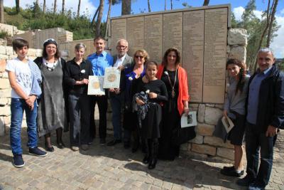 Veronique Dorothy with Holocaust survivor Henri Dzik and his family in Garden of the Righteous Among the Nations