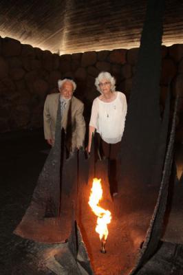 Olivier de Menthon (grandson of Henry de Menthon) and survivor Dina (Claire) Godschalk rekindle the eternal flame in the Hall of Remembrance, Yad Vashem, 5 September 2012