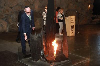 Anthonie Vink, son and grandson of the Righteous, was honored to rekindle the Eternal Flame during a memorial ceremony held in the Hall of Remembrance