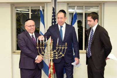 Amb. Nides lights Hanukkah candles with Yad Vashem Chairman Dani Dayan
