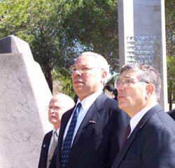 Sec. of State Powell with Avner Shalev (left) standing in front of the Pillar of Heroism. Israeli Ambassador to the United States, David Ivri, is far left